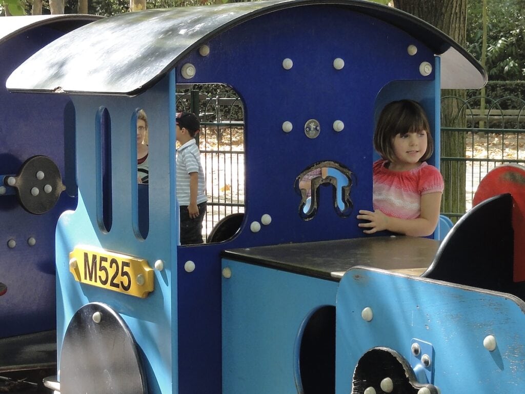 Girl on a train in Luxembourg Gardens, Paris