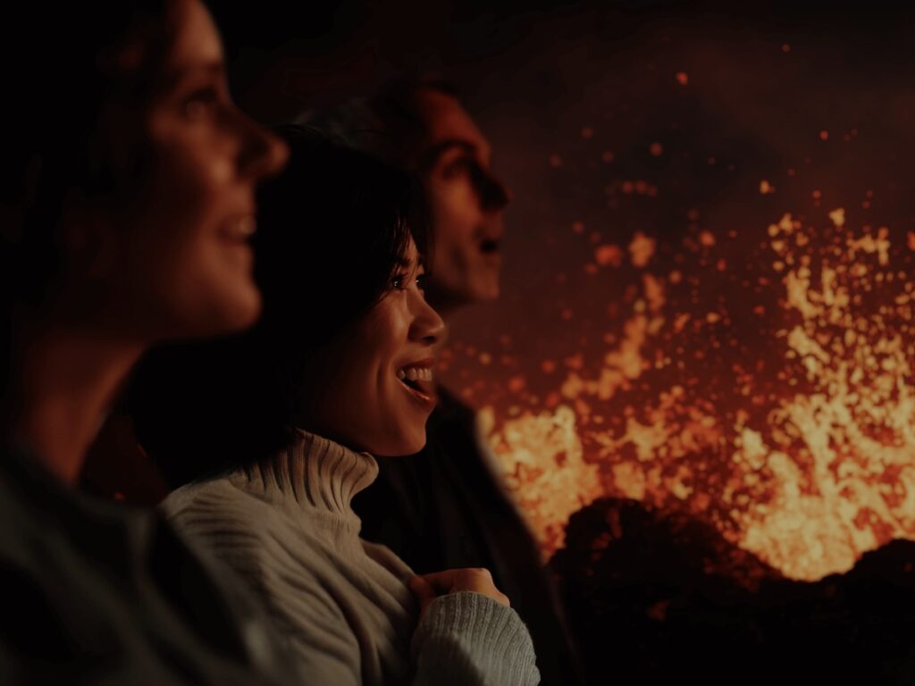 Woman watching the Volcano Express Show Reykjavik