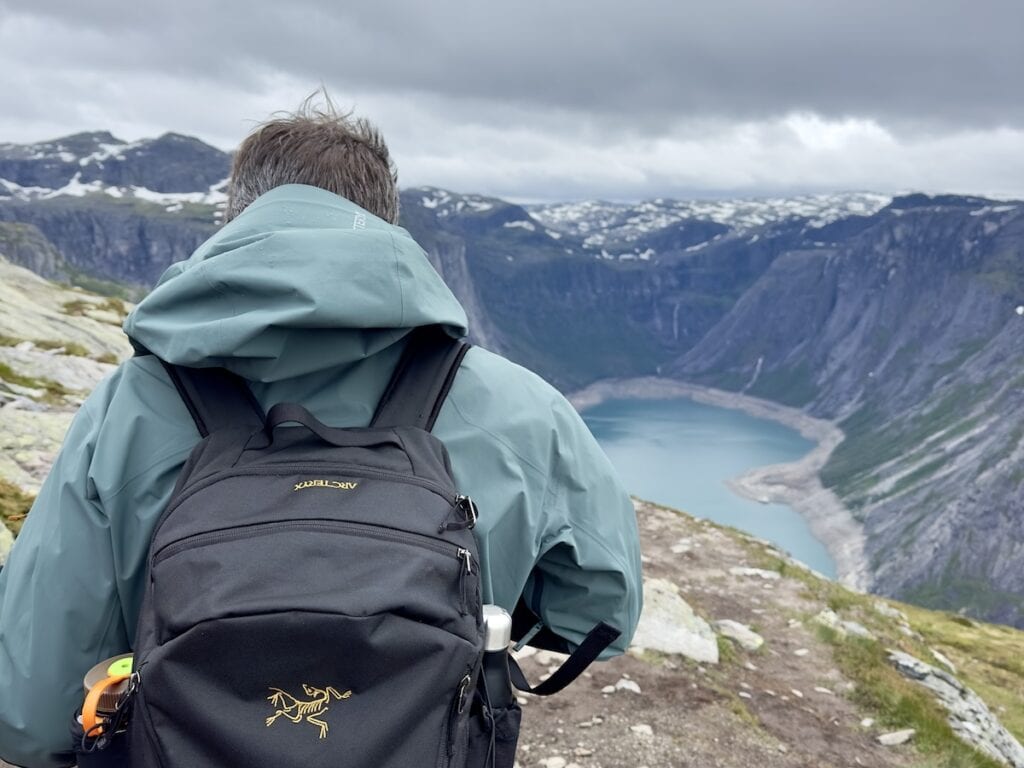 Man doing the Trolltunga hike on a glamping overnight trip