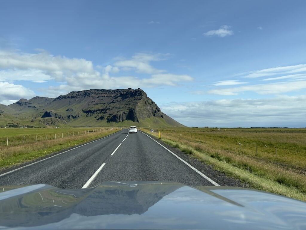 Driving on a dry easy road in Iceland in summer.