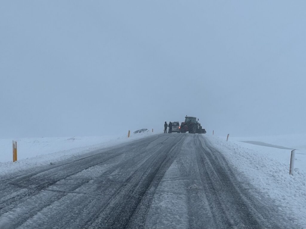 4x4 stopped on an icy road in South Iceland in winter.
