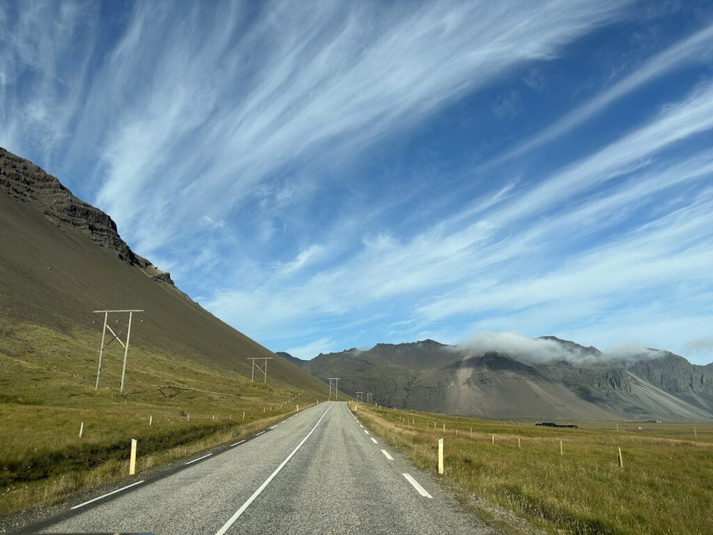A 4x4 driving the Iceland Ring Road in summer.