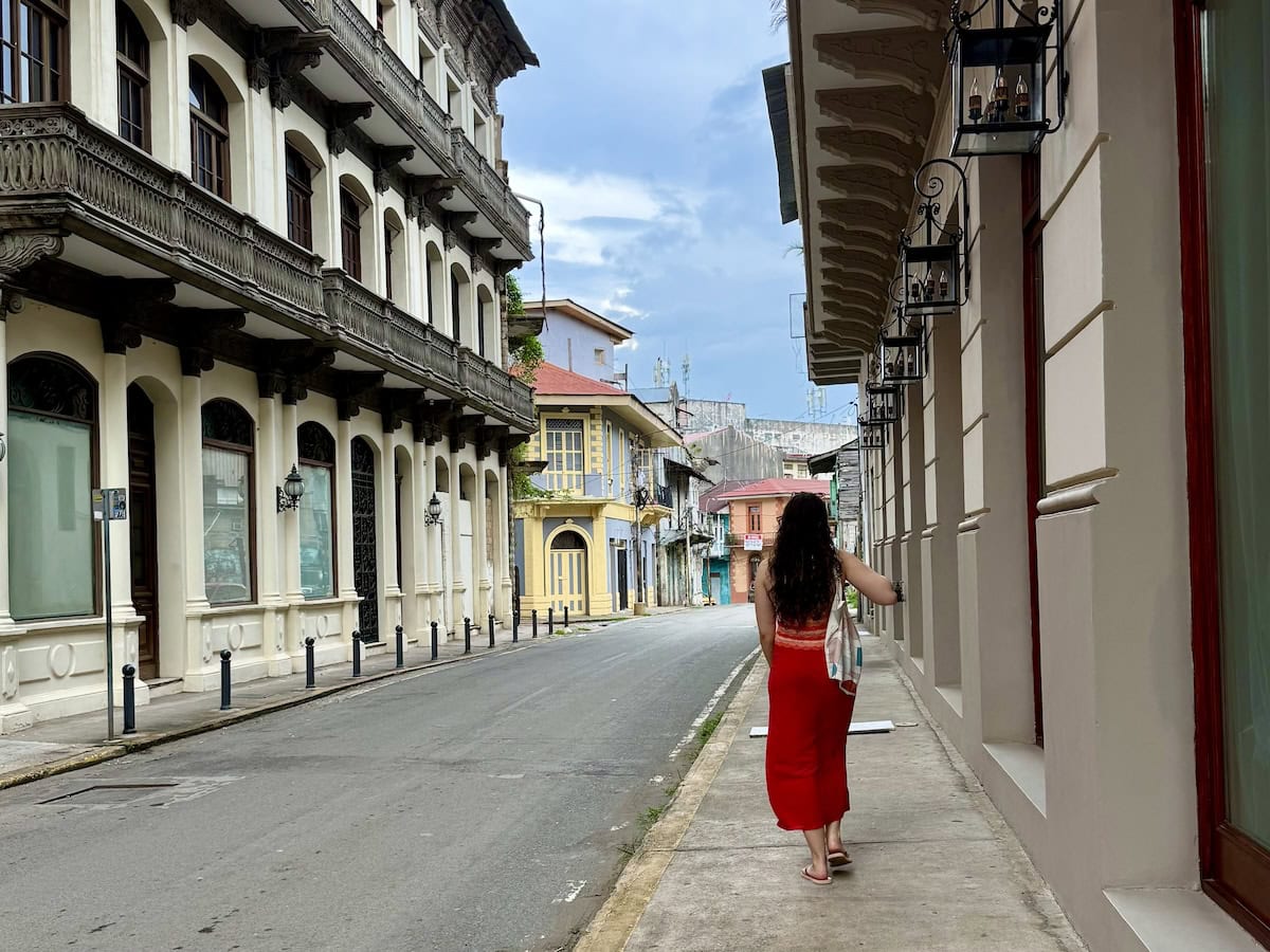 Young woman walking along a beautiful street in the Casco Viejo neighborhood of Panama City