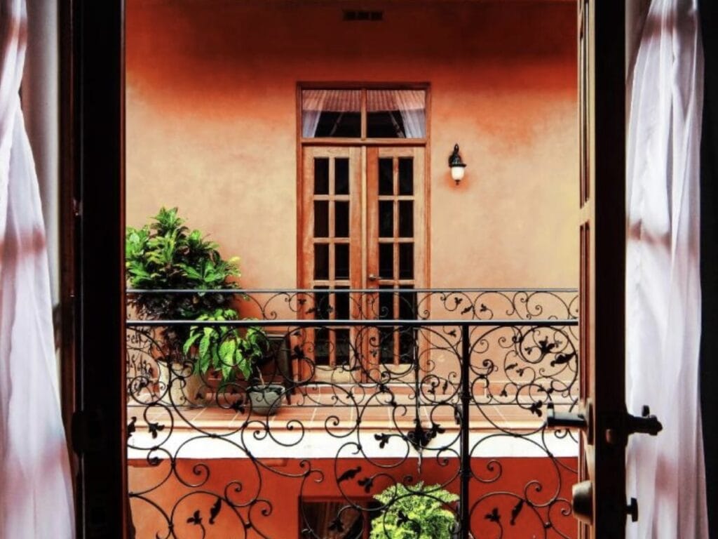 View from the balcony into the interior courtyard of Las Isabela Suites hotel in Casco Viejo, Panama