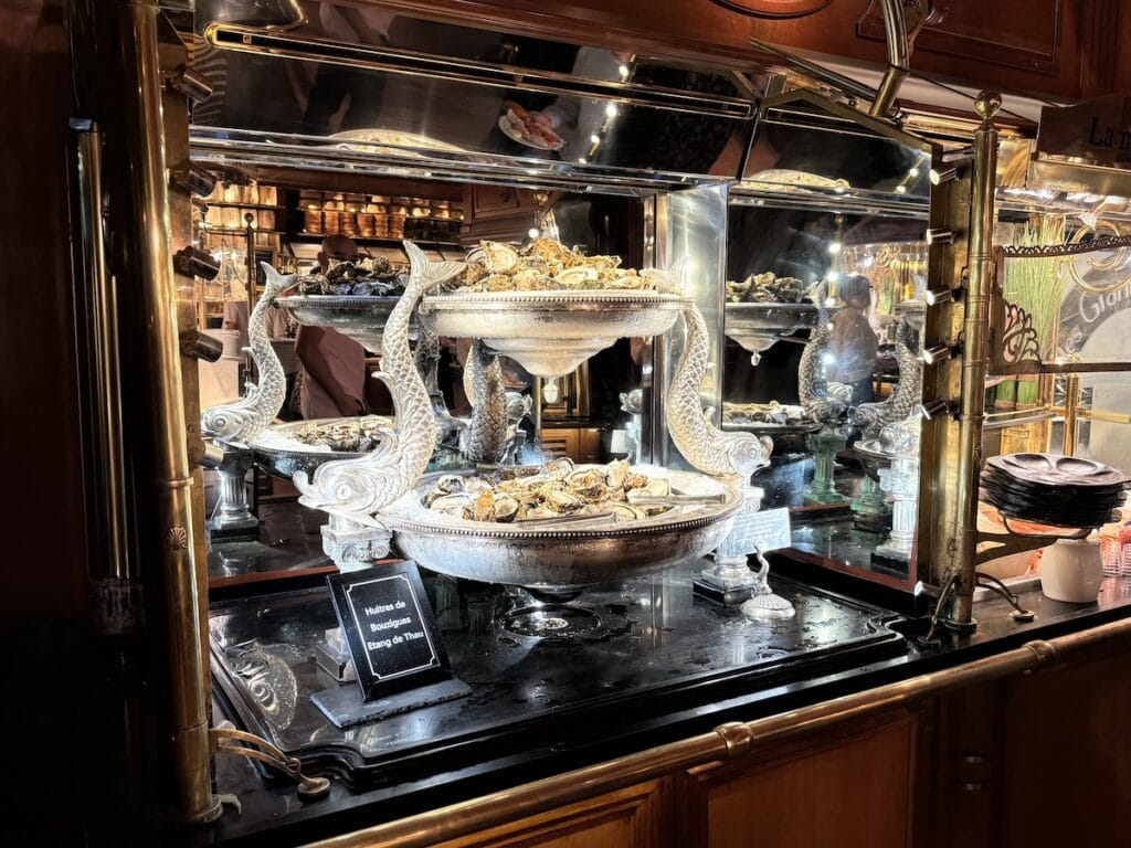 A solid silver seafood serving tray at Les Grands Buffets